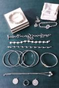 A Gucci silver bauble bracelet, a pair of earrings with pouch, hallmarked and impressed for Gucci; a