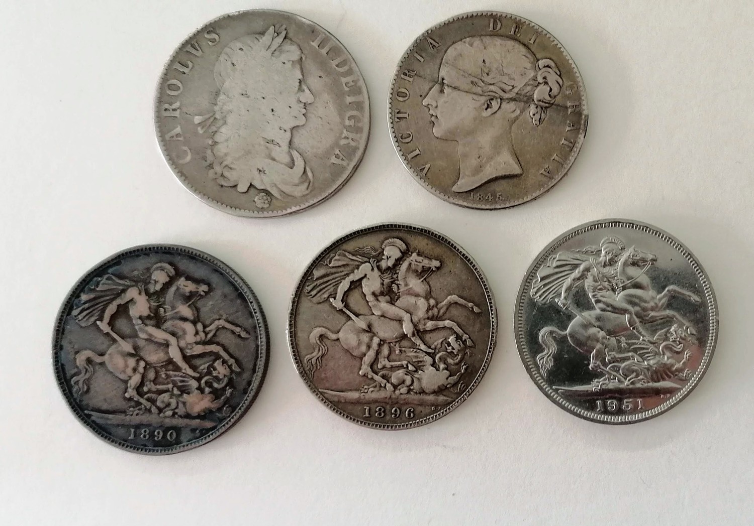A Charles II crown dated 1662; a Queen Victoria crown dated 1845, young head l, regnal year to the