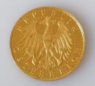 An Austrian 1929 First Republic 100 schilling gold coin, 23.56g