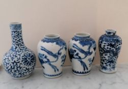 A pair of late 19th century/early 20th century blue and white baluster vases, each 12.5 cm H (one