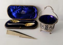 A cased pair of George II silver berry spoon by Benjamin Cartwright II, London, 1759, both