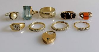 A selection of eight gold gem-set rings, a lock, all hallmarked 9ct, another ring not stamped,
