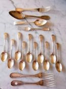 A Victorian set of ten fiddle pattern silver teaspoons by Chawner & Co., London, 1868, crested, each