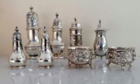 A pair of Victorian silver salts with oak leaf and acorn decoration on scroll feet by Mappin & Webb,