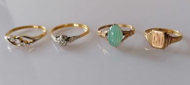 A yellow gold and platinum solitaire diamond ring in an illusion setting and a mid-century three-