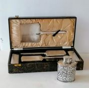 A late Victorian silver tea canister with profuse rococo decoration by Robert James Chaplin & Sons,