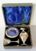 A cased Edwardian three-piece silver travel communion set by Roberts & Belk, Sheffield, 1905