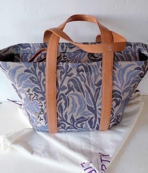 A Liberty of London large zippable tote bag woven jacquard fabric, leather straps trims