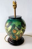 A Moorcroft Amazon Twilight lamp base designed by Nichola Slaney, c.1998, of ovoid shouldered form