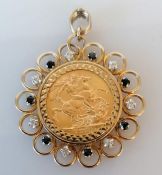 A mounted George V gold full sovereign pendant with sapphire and diamond decoration, dated 1915, hal