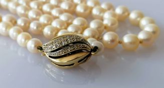 A mid-century single row of eighty-three cultured pearls, measuring from 5.62mm to 9.05mm