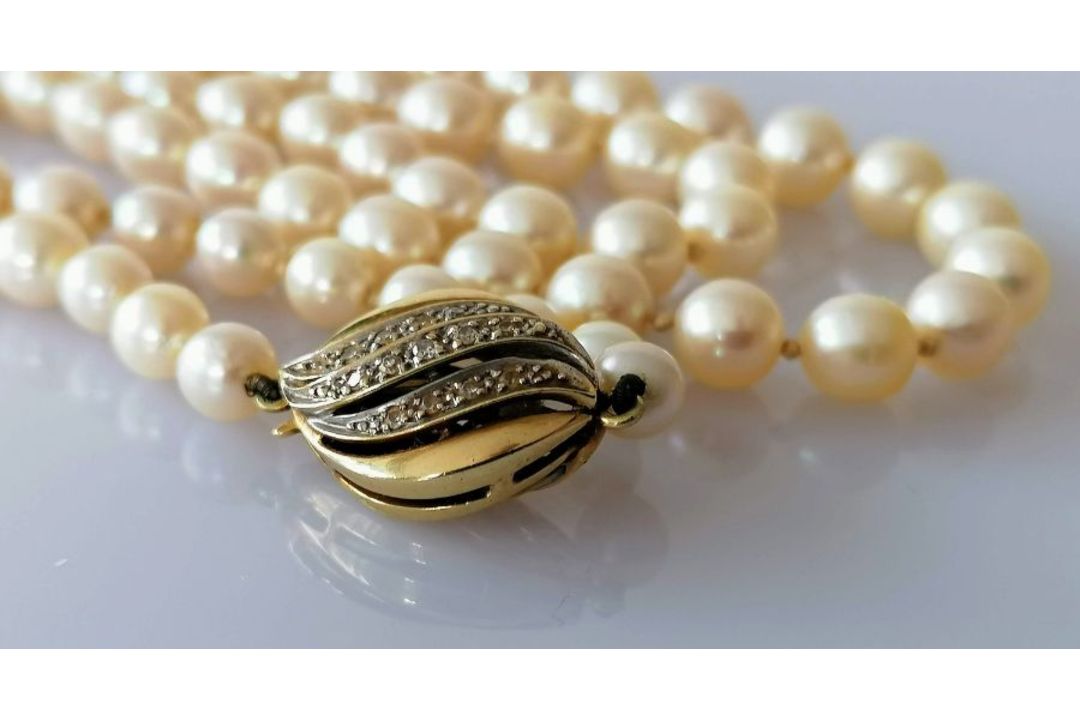 A mid-century single row of eighty-three cultured pearls, measuring from 5.62mm to 9.05mm - Image 1 of 3