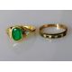An emerald and diamond gold ring, the oval emerald approximately 8 x 6 mm - Image 1 of 5