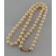 A single row of sixty-one cultured pearls, measuring 6mm to 6.3mm, medium cream colour - Image 2 of 3