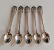 A set of five Georg Jensen silver coffee spoons, hallmarked, each 9.5 cm, 53g