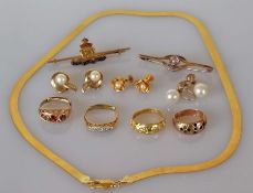 Two 18ct gold rings, one three-stone with peridot and diamonds, the other Art Deco illusion set with