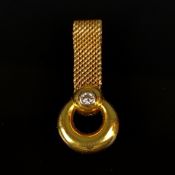 Brillant-Gold-Anhänger, 750/18K (punziert), 3,3g, mittig ein Dimant von um 0,065ct, Länge Anhänger