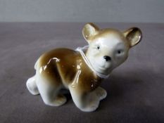 Kleine Porzellanfigur Bär S unter