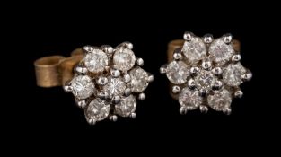 A pair of 9 carat gold diamond cluster ear studs,: set with brilliant cut diamonds, approximately 0.