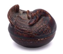 A Chinese brown glazed stoneware goose box and cover: the cover formed as a goose with head folded