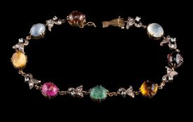 A multi gem set bracelet,: set with oval cabochon gemstones, including: pink tourmaline, emerald,