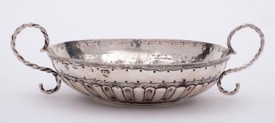 An 18th Century silver porringer, maker TK with pellet below, London,