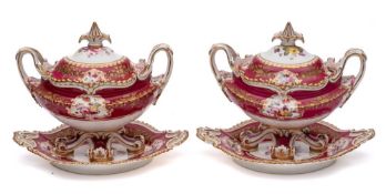 A pair of English porcelain two-handled oval tureens,