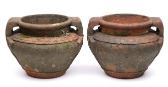 A pair of Compton Pottery-style terracotta two-handled garden urns: of Celtic design in the manner