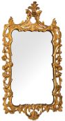 An early 19th Century giltwood cartouche-shaped mirror:,