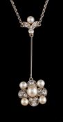 An early 20th century pearl and diamond pendant,: the central 4.