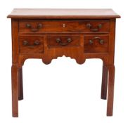 A George III mahogany rectangular lowboy:, the top with a moulded edge,