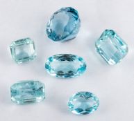 Six unset aquamarines,: the vari cut aquamarines approximately 58.00 carats total.