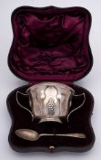 An Edward VII silver christening set, maker S W Smith & Co, London, 1903: of Art Nouveau influence,