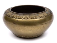 A large Chinese bronze censer: of squat circular form with lotus leaf decorated rim,