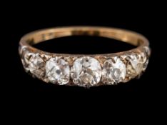 A diamond five stone ring:, set with five graduating old brilliant cut diamonds,