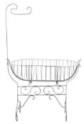 A wrought iron and white painted crib:, of traditional shape,