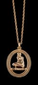 A 9 carat gold Virgo pendant,: the oval openwork pendant with a seated woman and Virgo beneath her,