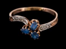 A sapphire and diamond crossover ring,