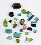 A group of unset tourmalines,: the vari cut and vari coloured tourmalines approximately 40.