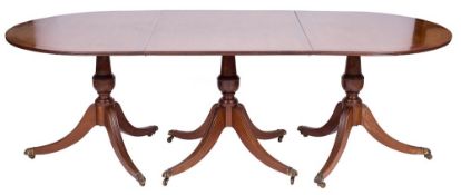 A mahogany D-end triple pillar dining table:, in the Regency taste,