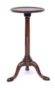 A George II walnut tripod table or kettle stand, elements 18th century and later,