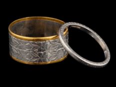 A platinum ring,: with engraved decoration, stamped platinum,