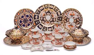 A group of Royal Crown Derby Imari wares: comprising a pair of shaped plates, iron-red marks, pat.