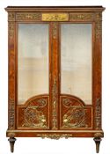 A mahogany and gilt bronze mounted and glazed vitrine in Louis XVI style,