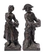 A pair of 19th century French bronze genre figures: of a peasant boy organ grinder and a peasant