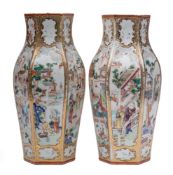A pair of Chinese famille rose vases: of baluster hexagonal form,