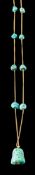 A turquoise matrix bead mounted guard chain with pendant drop,: 48cm long.
