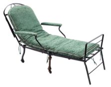 A Victorian black painted wrought iron metamorphic campaign chair/bed, last quarter 19th century,