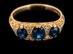 An 18 carat gold sapphire and diamond ring,
