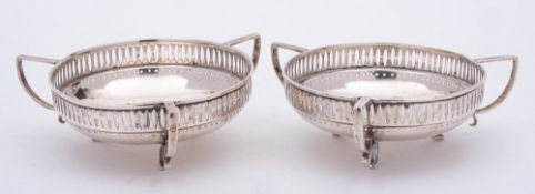 A pair of George V silver bon bon dishes.